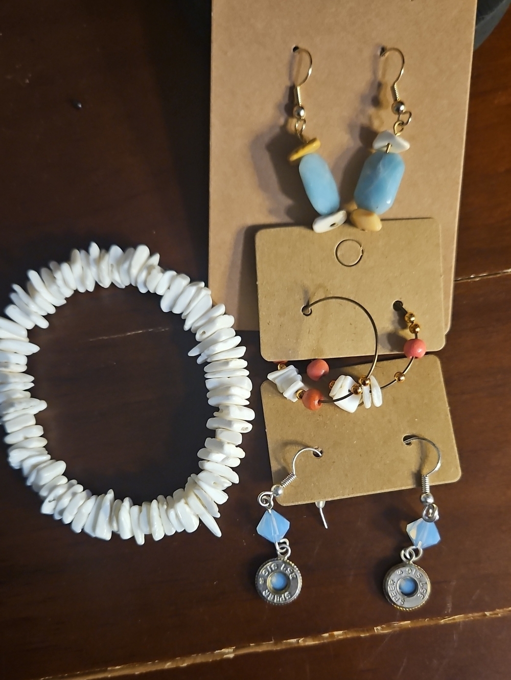 White Shell Stretch Bracelet with Blue Bead Accent Earrings Set
